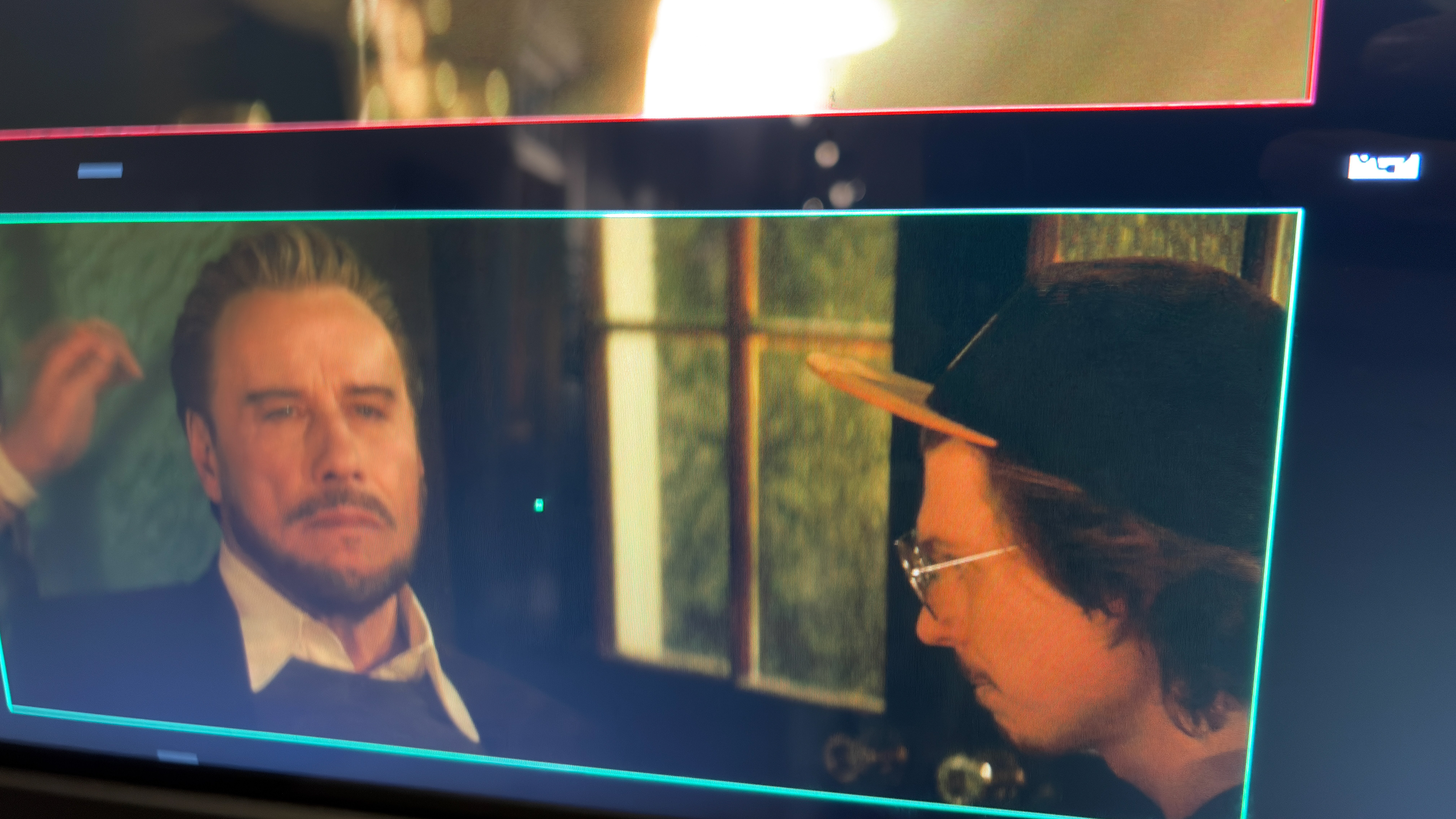 Two camera monitors showing a scene during production